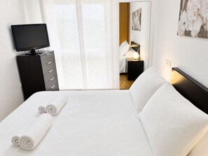 1 chambre, fer et planche Ă repasser, literie fournie