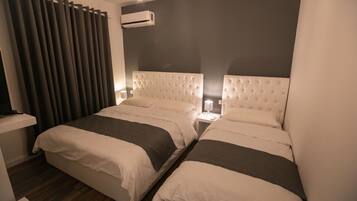 deluxe tripple room 101 ,204 | Truy cập Internet không dây miễn phí, bộ trải giường