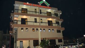 A multi-story hotel with balconies and a sign reading "Solo Hites Hotel".