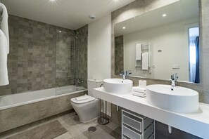 Bathtub, hair dryer, towels