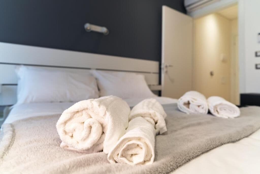 Premium bedding, down comforters, individually decorated