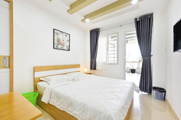 Basic Room, 1 Queen Bed, City View, Tower | 1 bedroom, desk, free WiFi