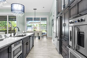 Fridge, microwave, oven, stovetop - Luxurious 4BR Beach House w/  Guest House! 2 GOLF CARTS, PRIVATE pool, Lanai. (Mirarmar Beach)