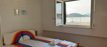 Relaxed Chic 2-Bed Apartment: Just Steps From the Beach