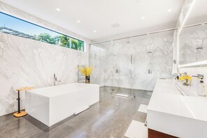 Bathtub, hair dryer, towels