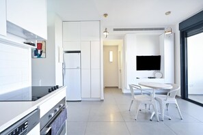Fridge, microwave, oven, stovetop - Cozy 2BR with Balcony and Mamad on Dizzengoff by HolyGuest (Tel Aviv-Yafo)