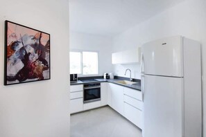 Fridge, microwave, oven, stovetop - Colorful 2BR with Balcony near Tel Aviv Port by HolyGuest (Tel Aviv-Yafo)