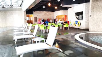 Indoor pool, open 8:00 AM to 9:00 PM, pool loungers