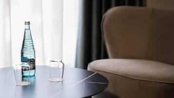 Hypoallergeen beddengoed, een minibar, een bureau, een laptopwerkplek