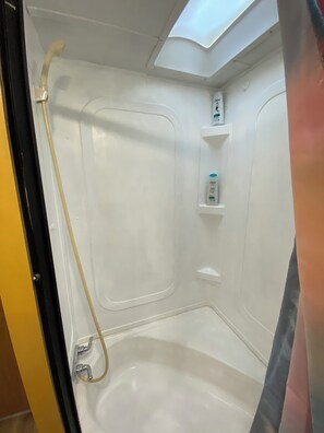 Hair dryer, towels, soap, shampoo