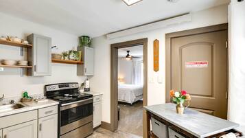 Fridge, microwave, stovetop, coffee/tea maker