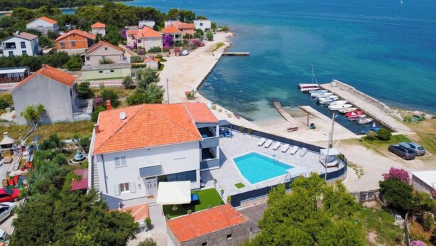 A coastal property with a swimming pool, beach access, and a marina. - Apartment Franka by Interhome (Pašman/Pašman)
