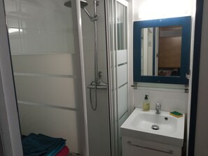 Hair dryer, towels, soap, shampoo