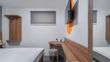 Deluxe Room | 1 bedroom, desk, laptop workspace, free WiFi