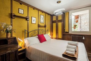 2 dormitorios, tabla de planchar con plancha, wifi gratis y ropa de cama