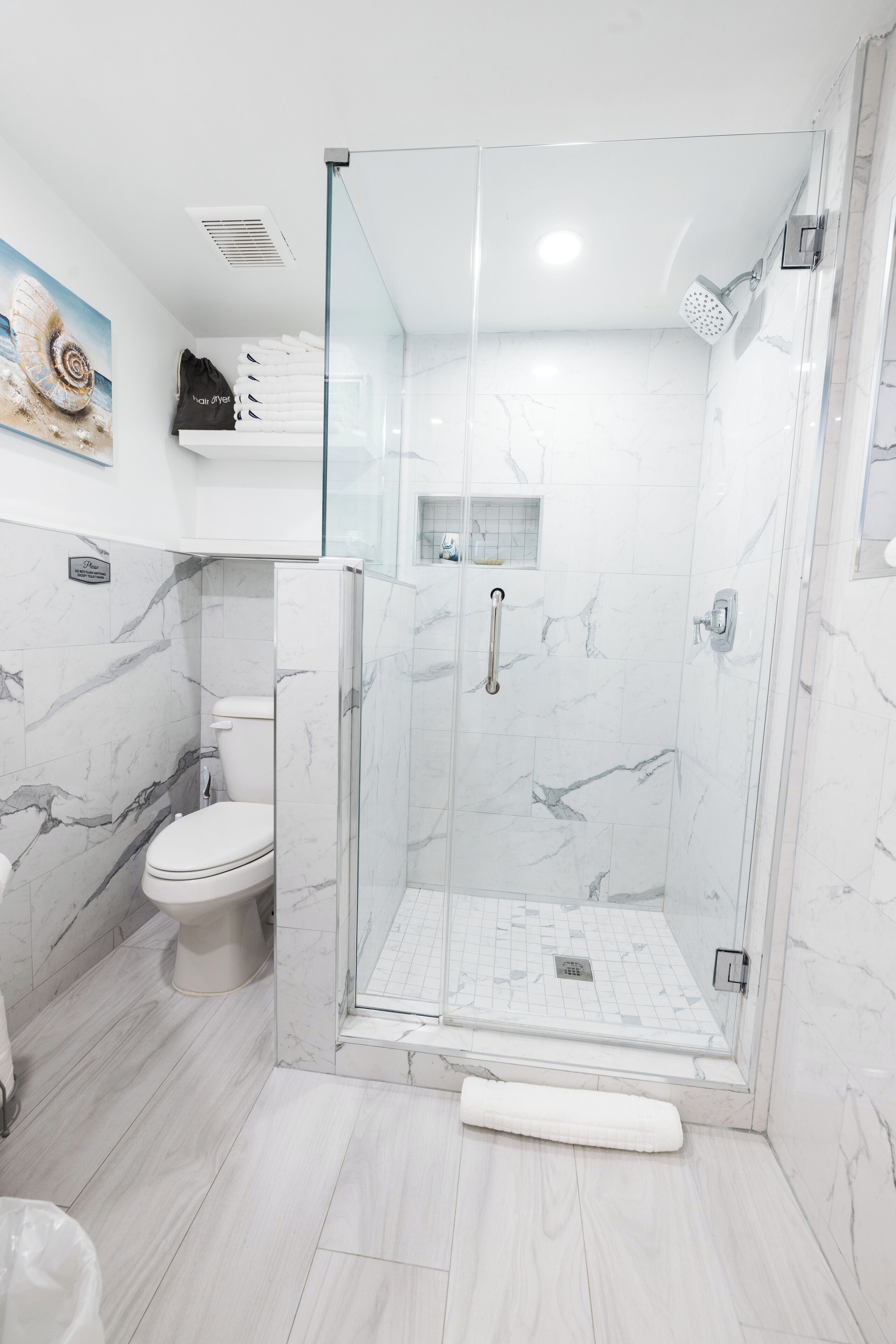 Hair dryer, towels, soap, shampoo