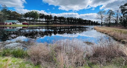 Private Retreat! 200 private gated acres with two ponds.