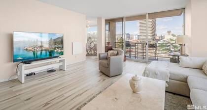 Reno 1 Bedroom, corner view condo, on the Truckee River Walk, bike, theater.