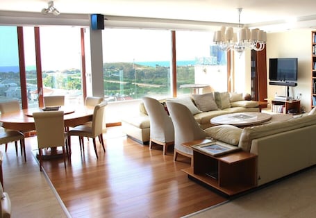 Smart TV, DVD player, books, music library. Stunning Sea View Penthouse Duplex: Unmatched Elegance with Breathtaking Views