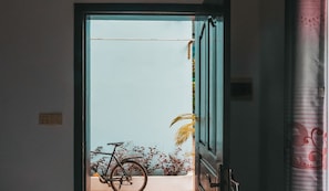 Habitación triple Deluxe | Terraza o patio