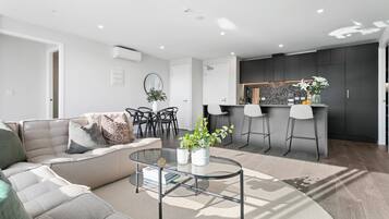 Luxury Apartment | Living area | Smart TV, Netflix, heated floors, streaming services