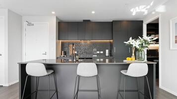 Luxury Apartment | Private kitchen | Full-size fridge, microwave, oven, stovetop