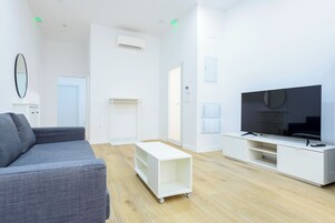 Apartamento estándar | Sala de estar
