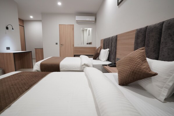 Phòng đôi hoặc 2 giường đơn Deluxe | Nệm cao su hoạt tính (memory foam)