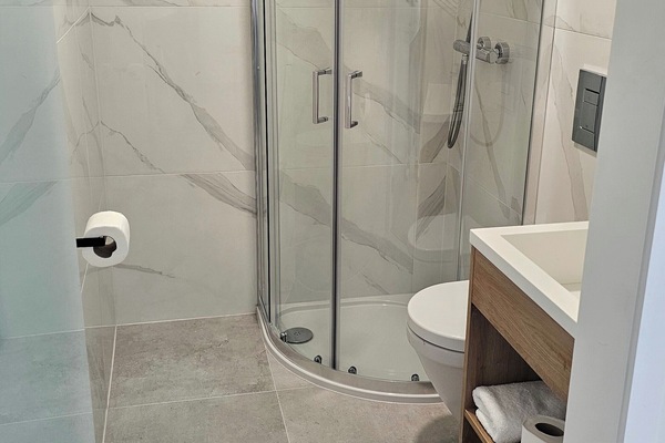 Double Room | Bathroom | Shower, hair dryer, towels, soap