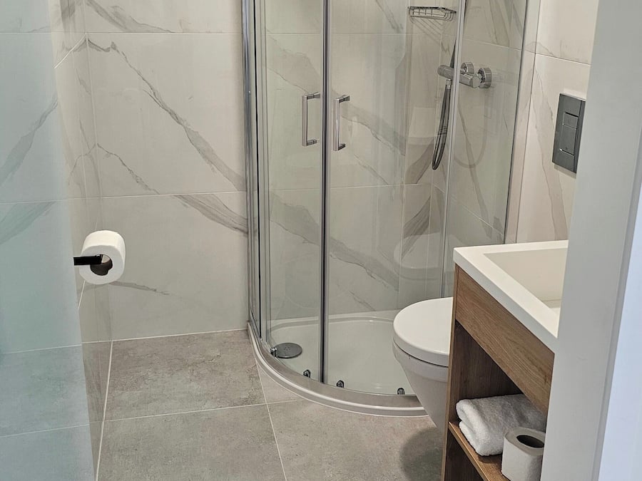 Double Room | Bathroom | Shower, hair dryer, towels, soap