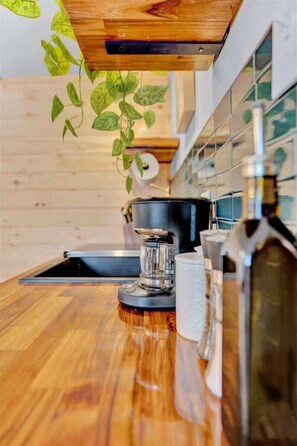 Fridge, microwave, stovetop, coffee/tea maker
