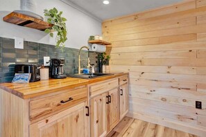 Fridge, microwave, stovetop, coffee/tea maker