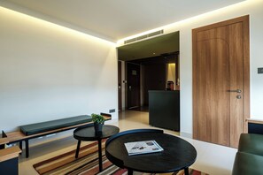 Urban Suite | Living area | 43-inch LCD TV with cable channels, books - INDIE STAYS JAIPUR (Jaipur)