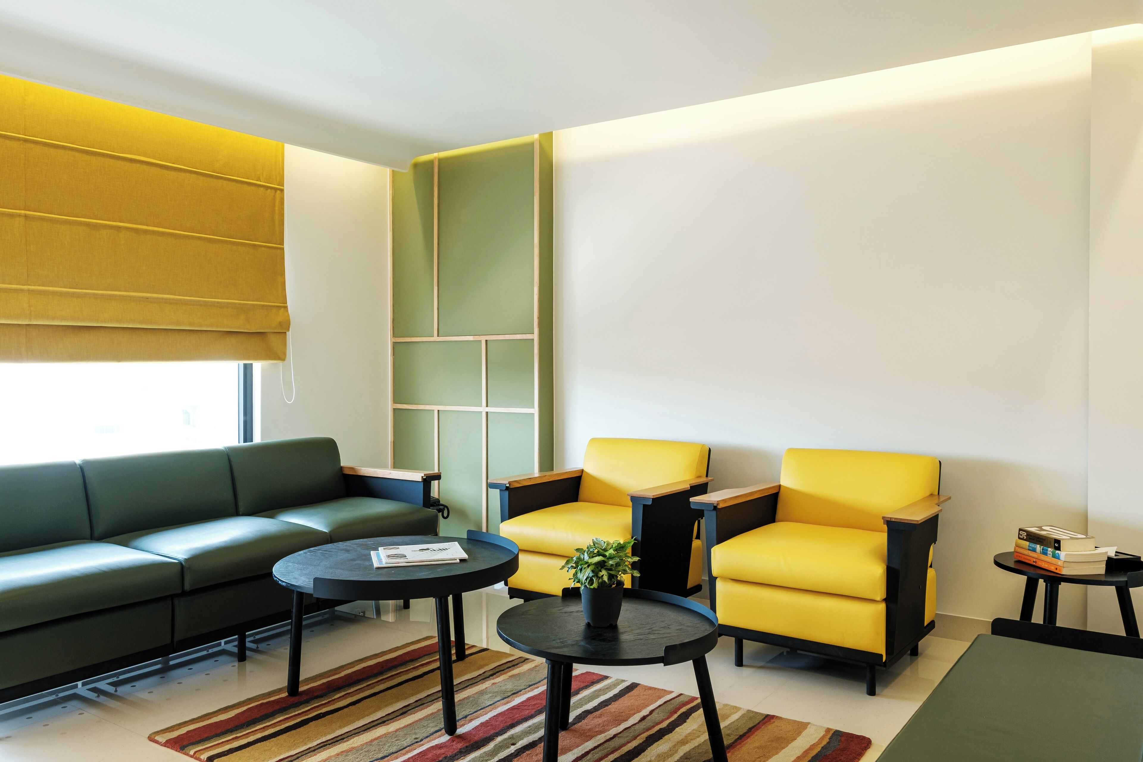 urban suite | living area | 43-inch lcd tv with cable channels, books