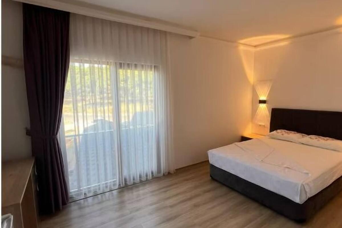 deluxe double room | premium bedding, select comfort beds, free minibar, laptop workspace