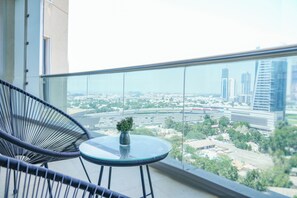 Comfort Studio | Balcony -  Yogi - Serene Romance in a Stylish Studio with City Views (Dubai)
