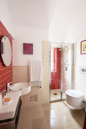 Hair dryer, bidet, towels, soap