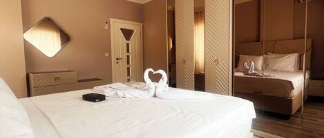 4 habitaciones, caja de seguridad en la habitación y cortinas blackout