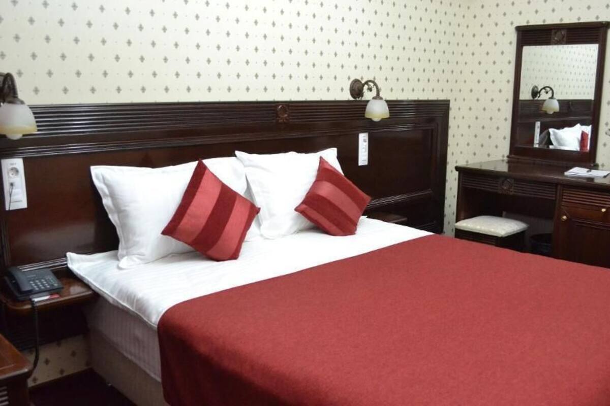 Habitación ejecutiva | Sábanas italianas Frette, ropa de cama de alta calidad y minibar
