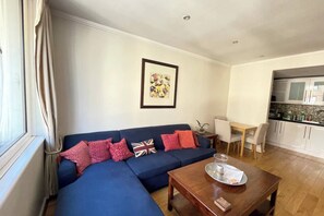 Basic Apartment, 1 Double Bed with Sofa bed | Living area | TV