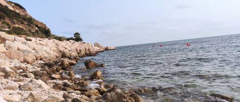 On the beach, white sand