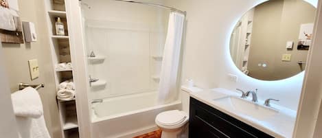 Hair dryer, towels, soap, shampoo