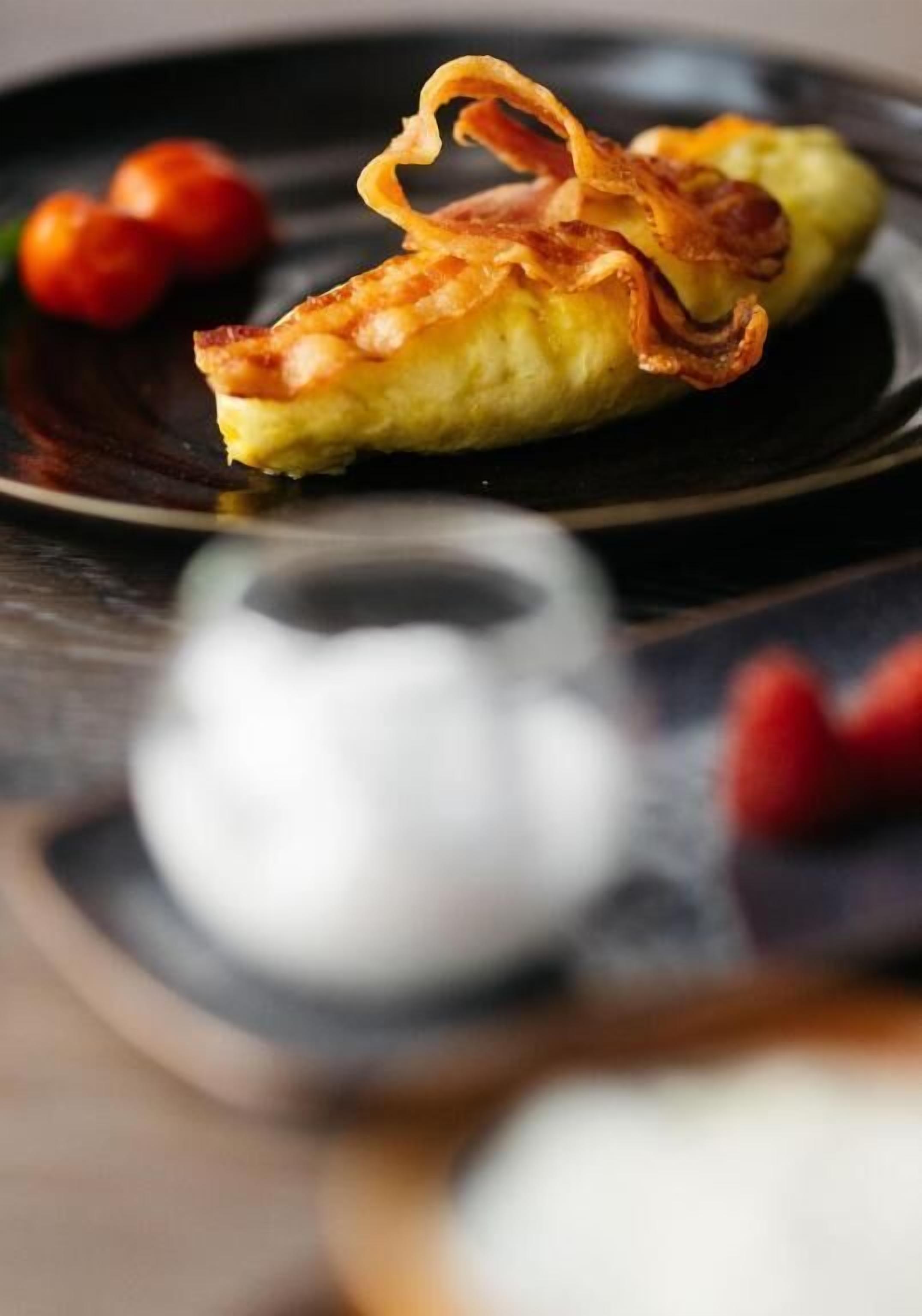 A dessert on a plate with a dark background.
