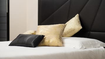 Premium bedding, down duvets, minibar, in-room safe