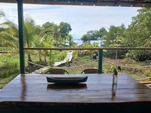 Outdoor dining - Cozy Casita Margarita - w/private dock with sunset views over the bay. (Bocas del Toro Province)
