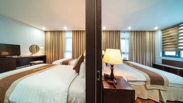 Superior vierpersoonskamer | 1 slaapkamer, luxe beddengoed, een minibar, een kluis op de kamer