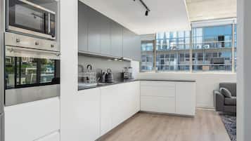 Luxury Apartment | Private kitchen | Fridge, microwave