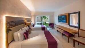 A hotel room with two beds, a large window, a TV, and a bench. - Viva Azteca by Wyndham, A Trademark All Inclusive Resort (PLAYA DEL CARMEN)