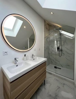 Shower, hair dryer, towels, soap