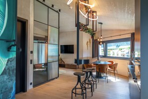 Penthouse | Private kitchen | Full-sized fridge, microwave, oven, stovetop - LIFESTEIL Appartementresort (Umhausen)